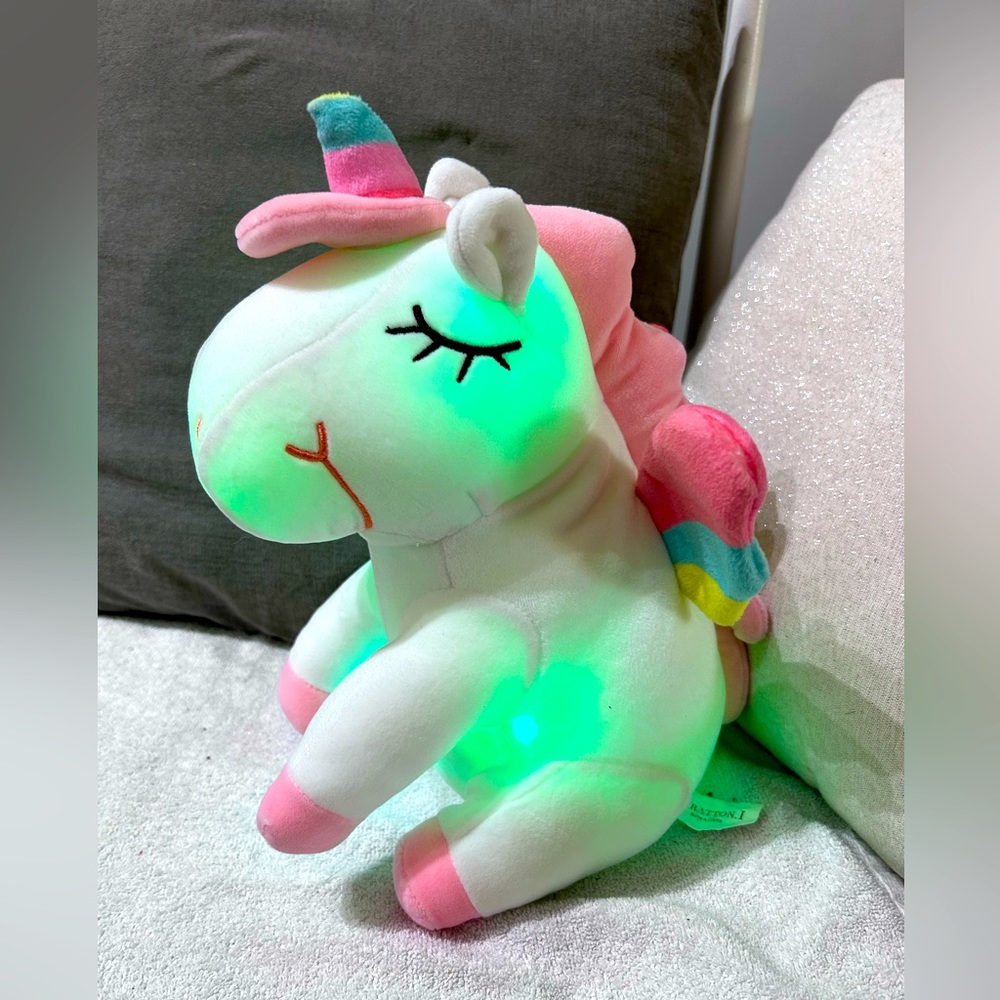 Plush unicorn with color changing lights